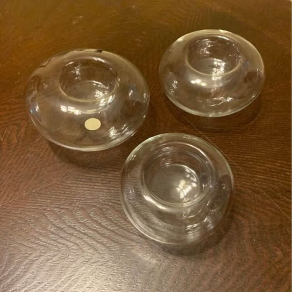 Floating tealight candle holders